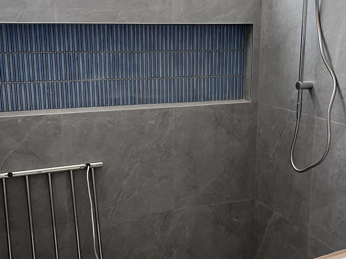 Canberra bathroom and laundry waterproofing coordinated with substrate preparation, penetrations, junctions, floor wastes and the following tile installation.