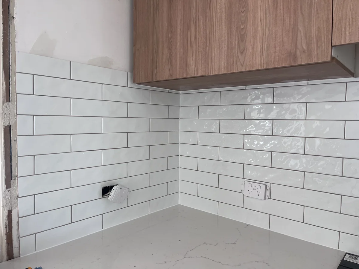 Canberra tile repairs, replacement tiles, regrouting and silicone renewal for suitable residential bathrooms, showers, floors and splashbacks.